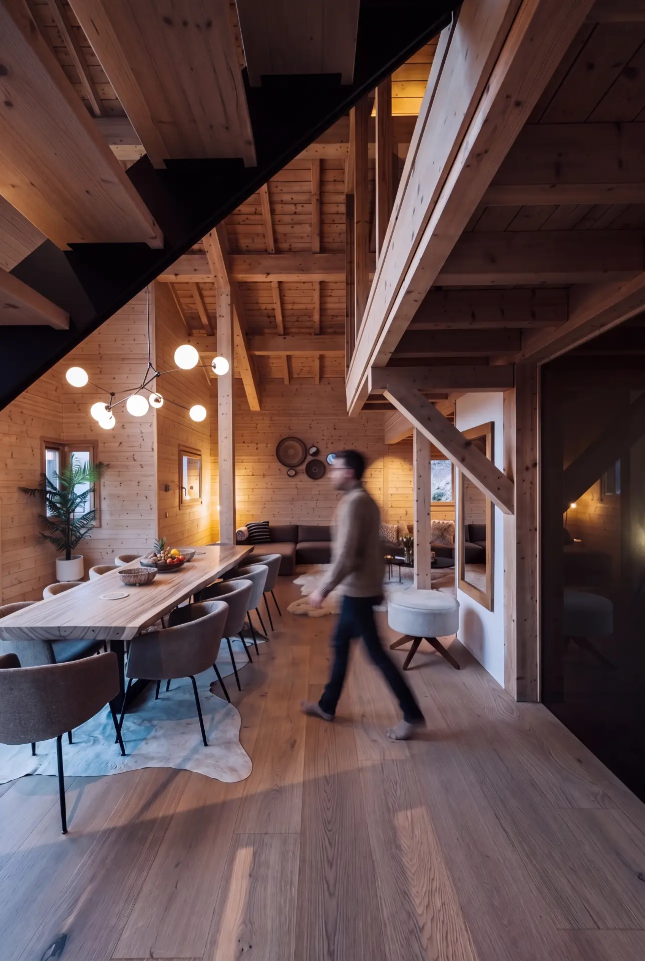 Open-plan dining and living interior of Chalet Bouton d'Or